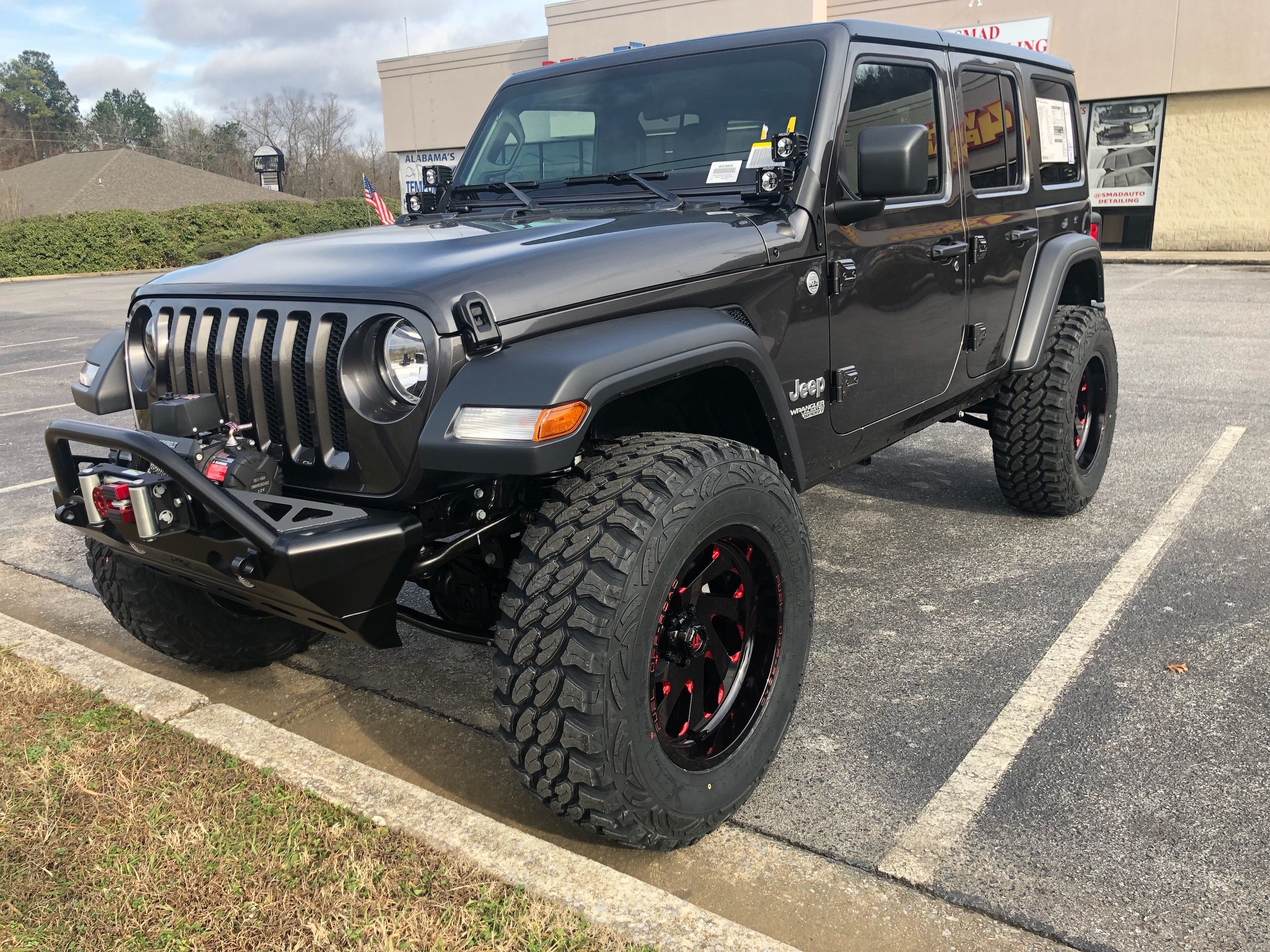 lifted JK Wrangler 2014 Dune color with Atlas bumpers from DSI